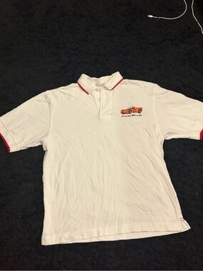 Cutter & Buck White Polo with Red Trim and Orange Car Embroidery